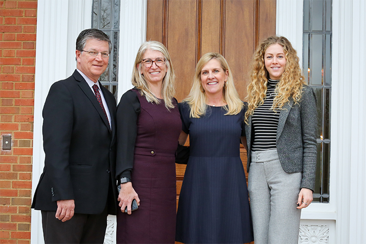 Jennifer Cruse-Sanders, Shelly Prescott, and Lauren Muller from the State Botanical Garden pose with Georgia First Lady Marty Kemp in front of the Governor's Mansion.