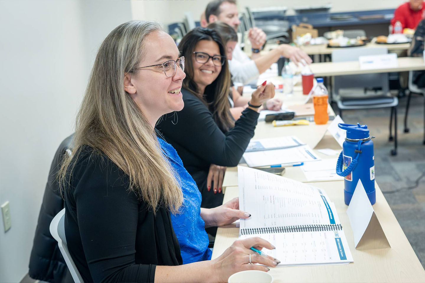 woman speaks at a workshop