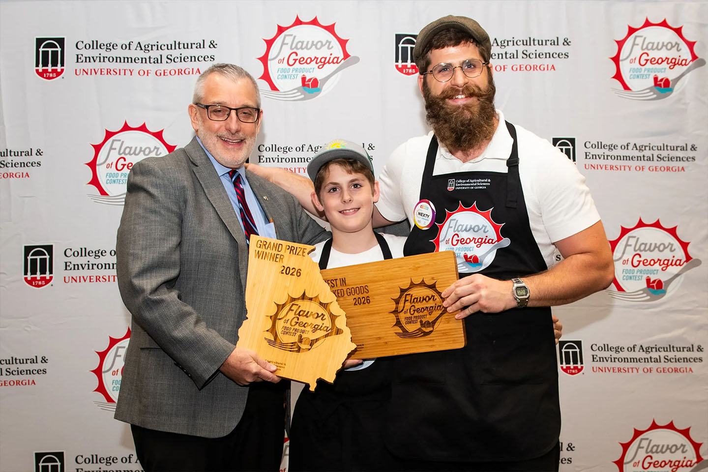 father and son with dean nick place and the flavor of georgia trophy