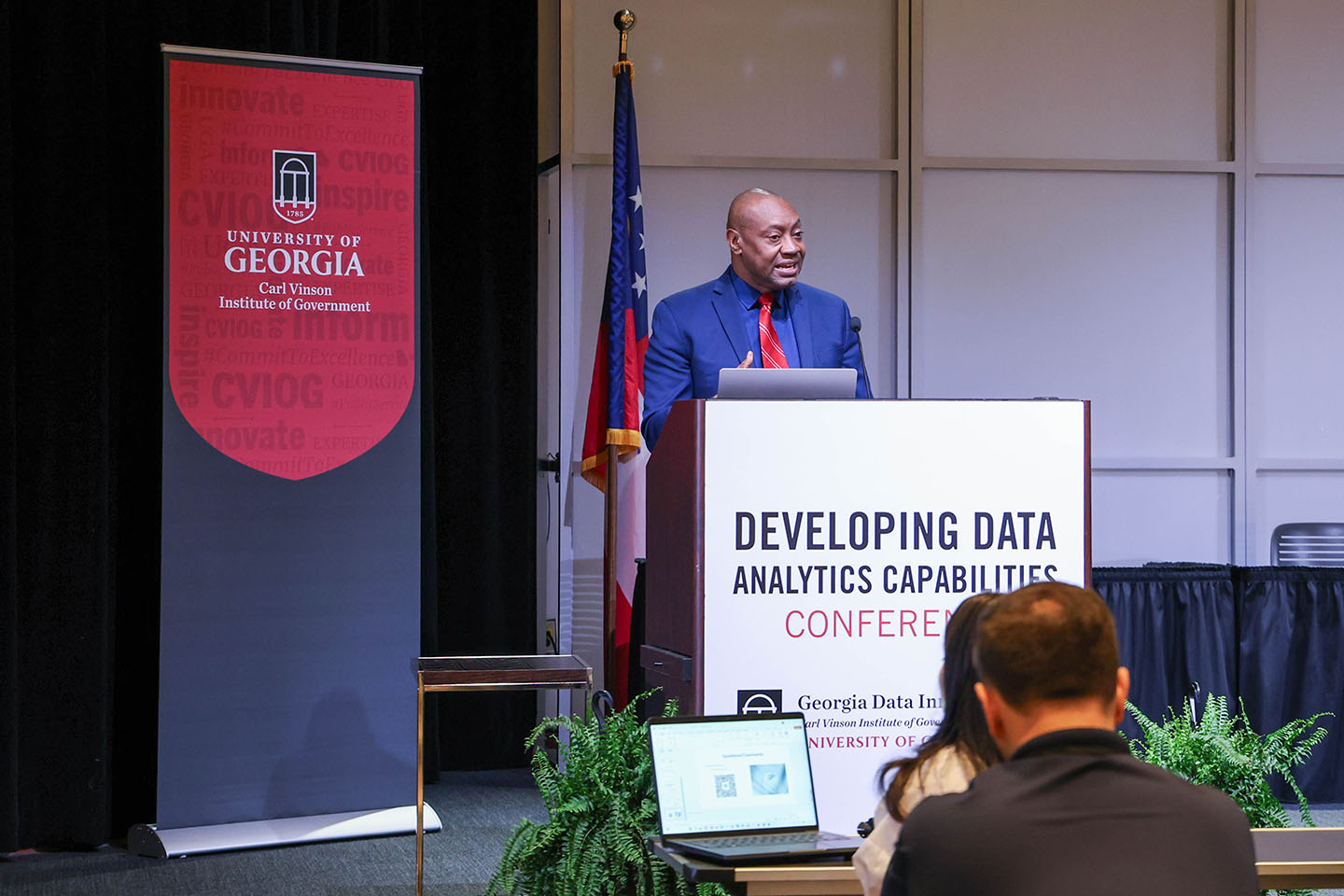Marshall Shepherd talks to a crowd at the conference